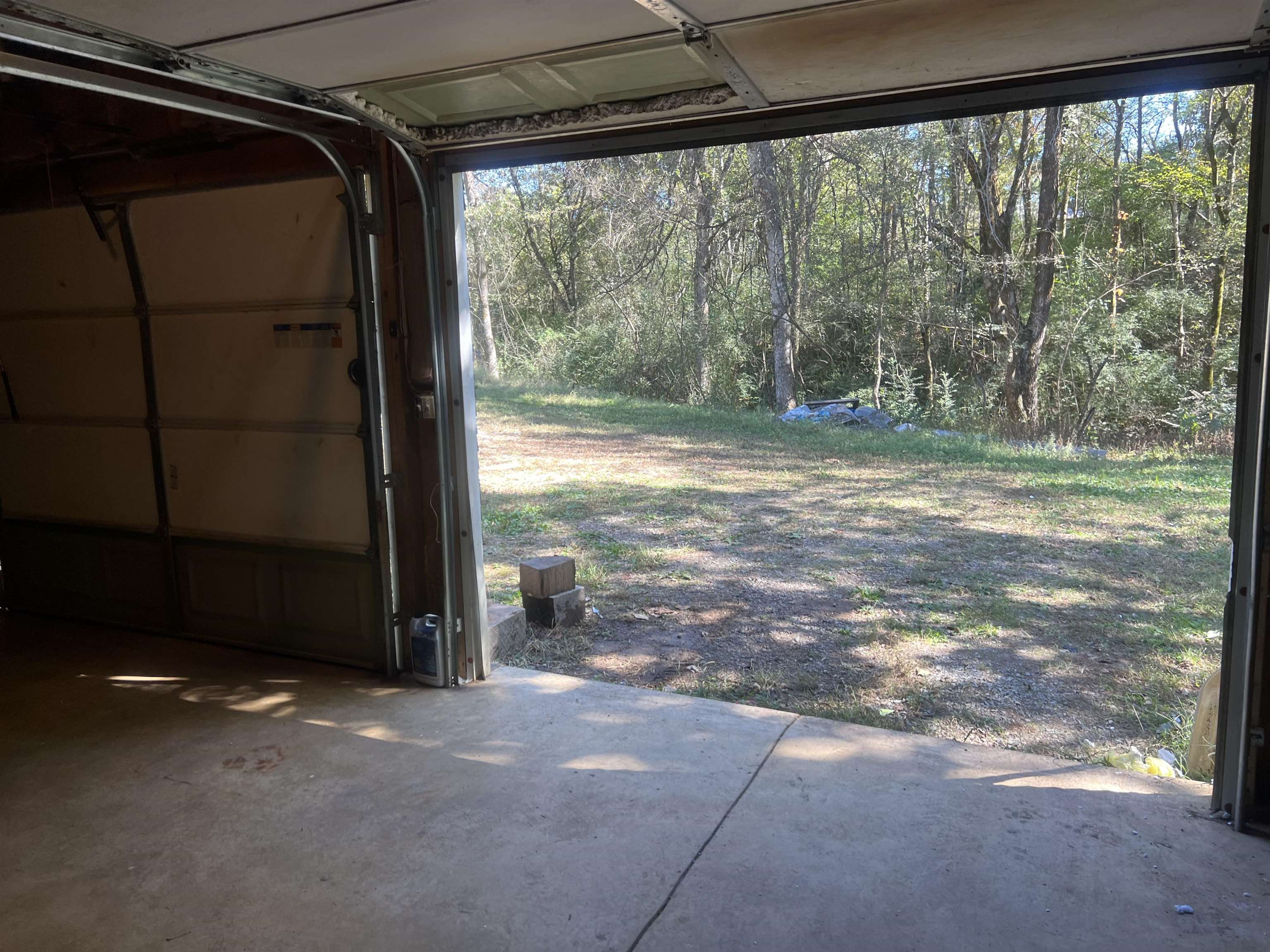 245 Drake Loop Savannah, TN 38372 - Photo 13 of 17 a view of a car parking garage
