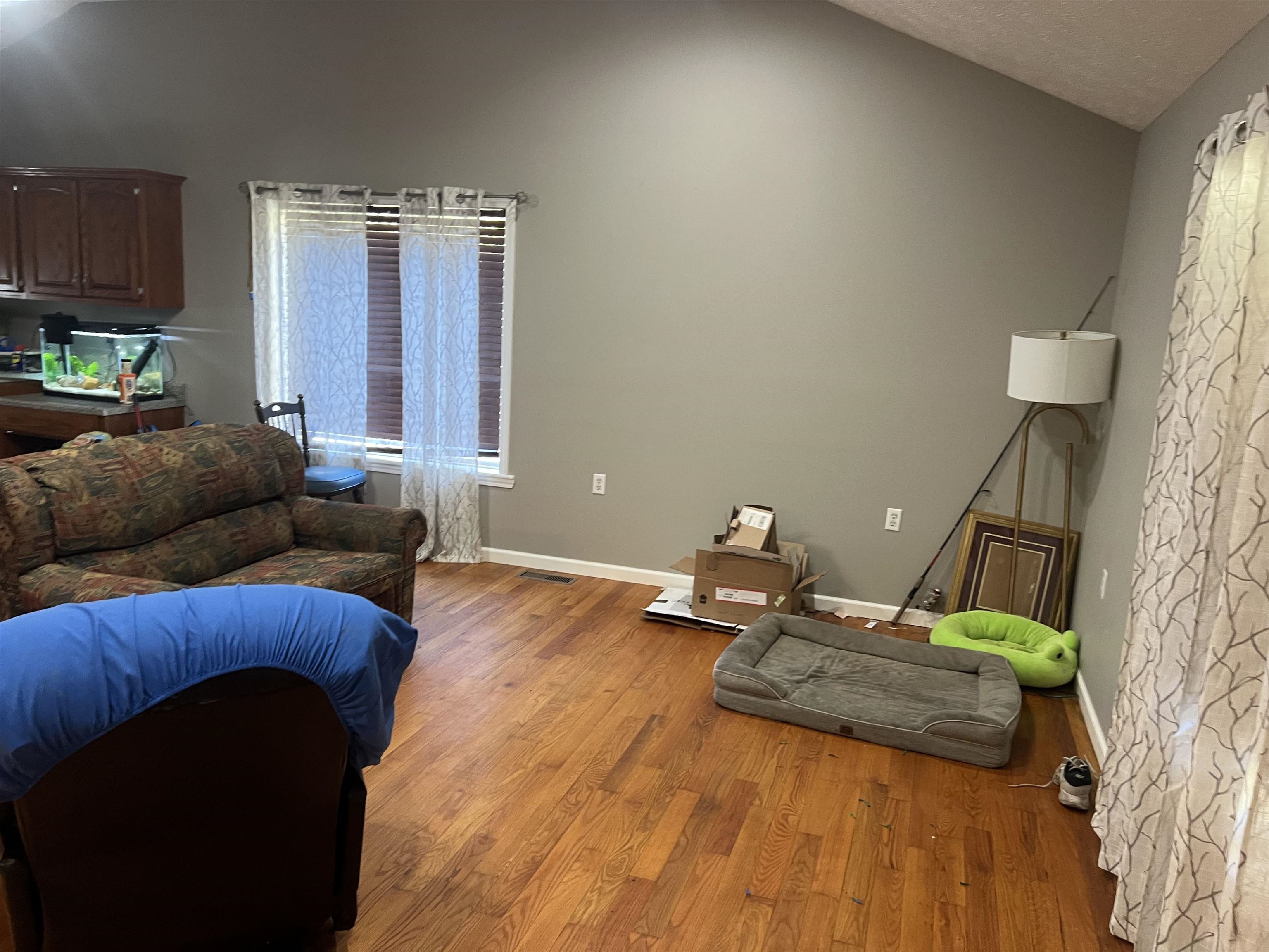 245 Drake Loop Savannah, TN 38372 - Photo 5 of 17 a bedroom with furniture and a wooden floor
