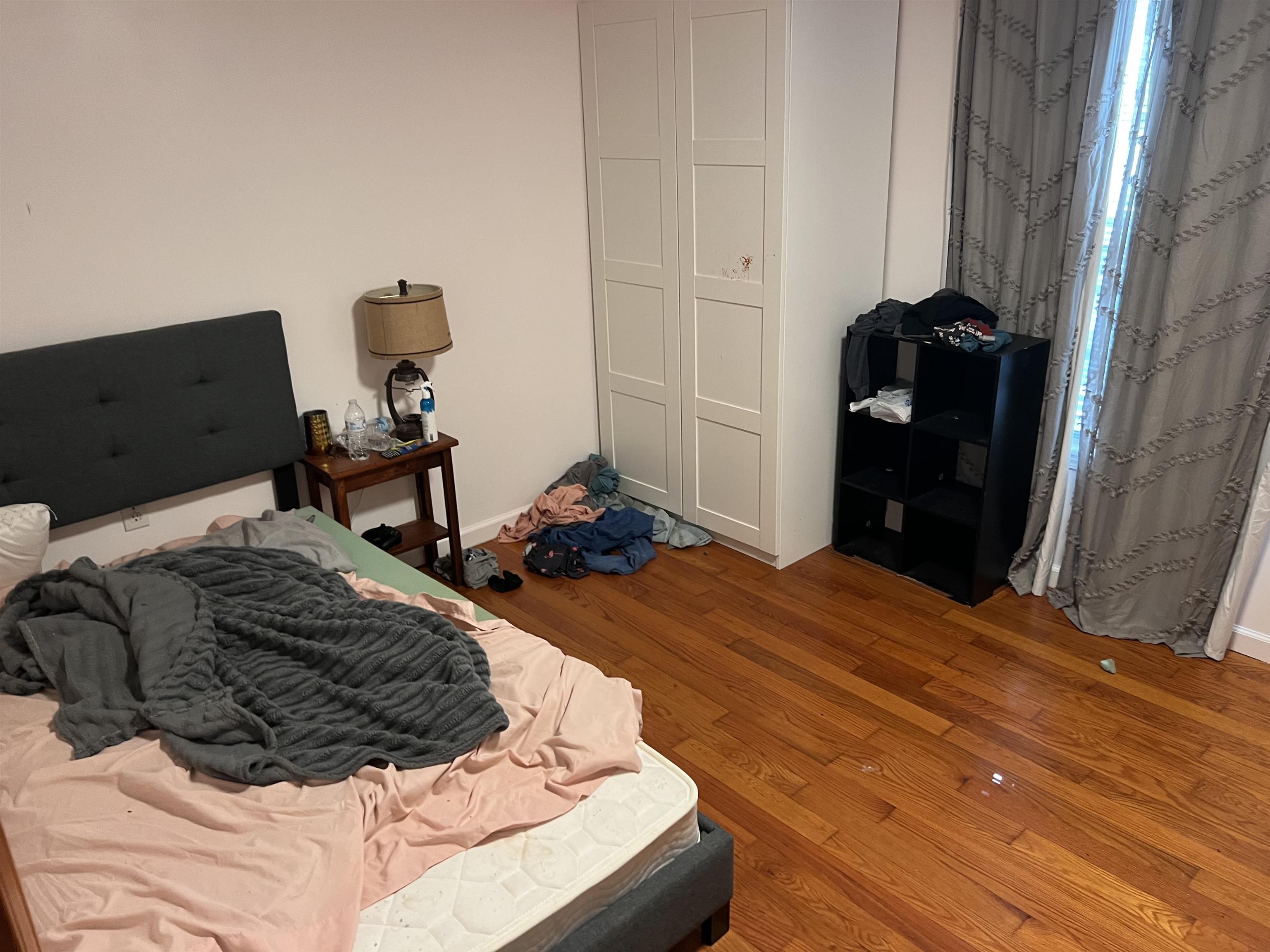 245 Drake Loop Savannah, TN 38372 - Photo 6 of 17 a bed room with a bed and a chair