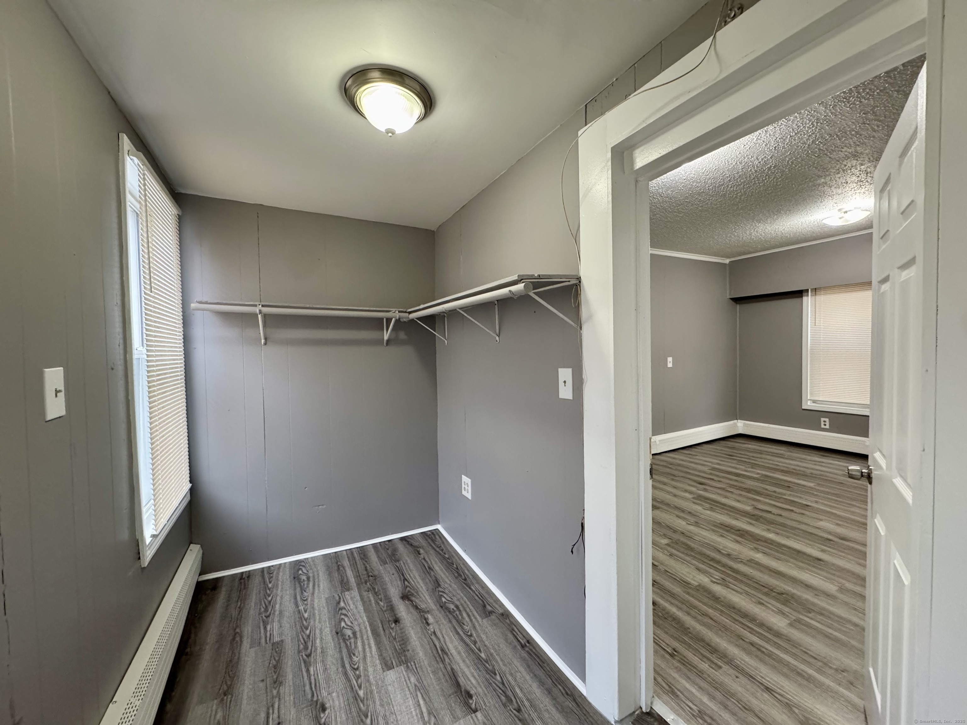 1102 East Main Street, Unit 1 Bridgeport, CT 06608 - Photo 12 of 14 a view of an empty walk in closet