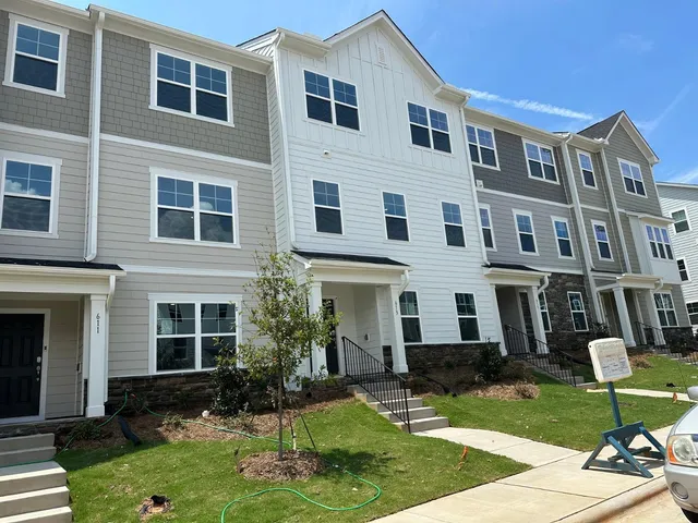 a front view of a house having yard