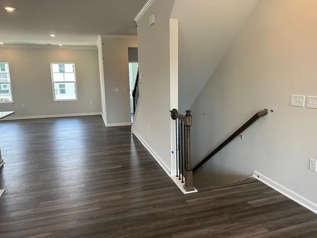 a view of entryway with wooden floor