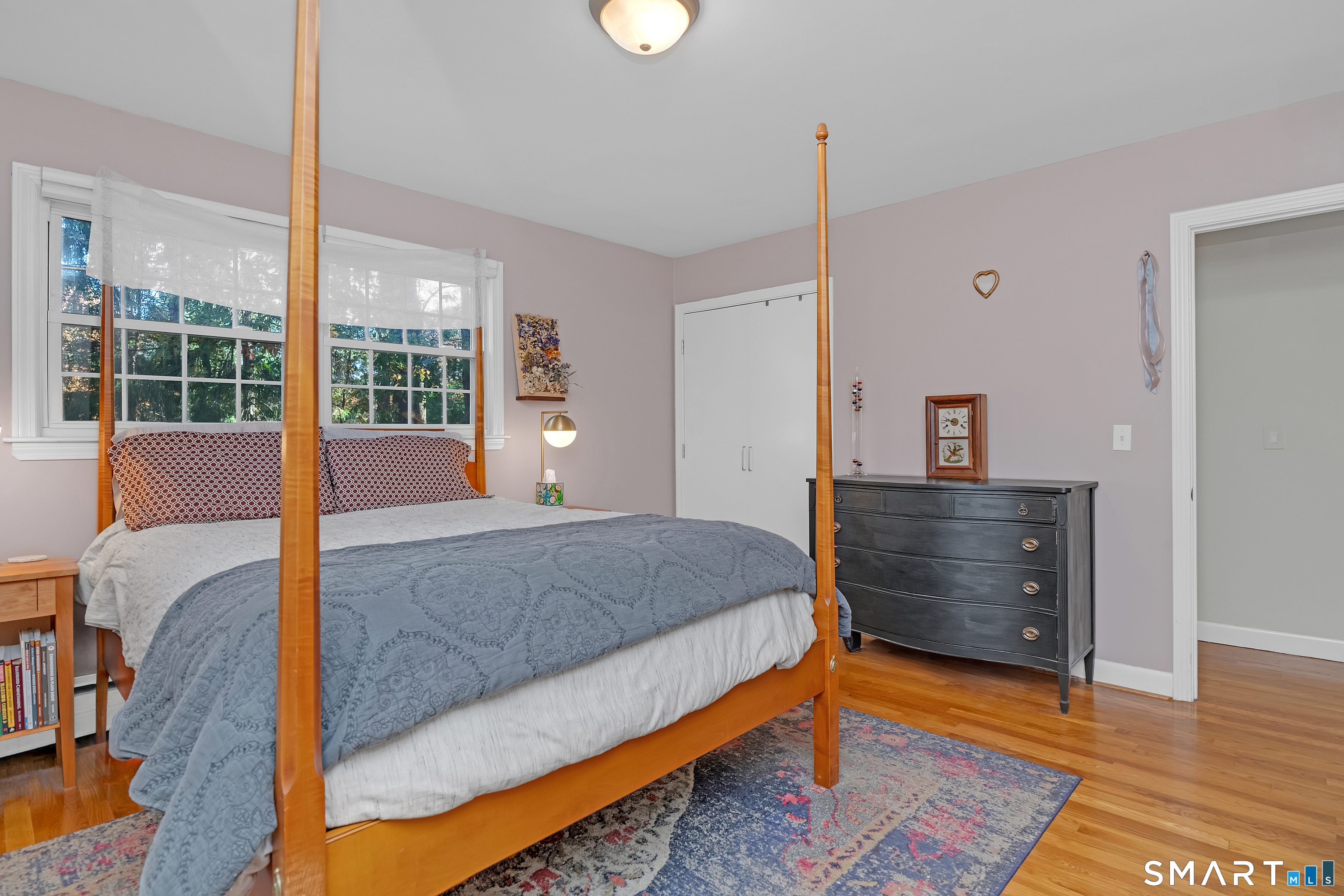 16 Marion Road Bethany, CT 06524 - Photo 21 of 40 a bedroom with a bed and large window