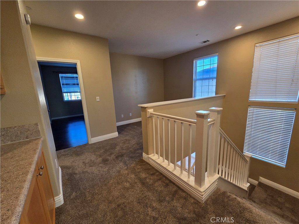 20329 Red Poppy Lane Riverside, CA 92508 - Photo 20 of 31 a view of a hallway with entryway