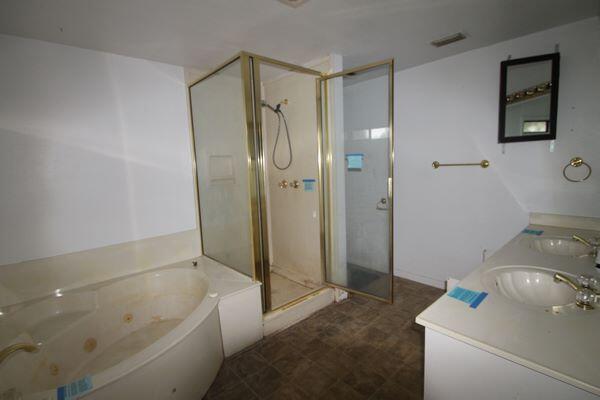 6047 Eden Square Crestview, FL 32539 - Photo 21 of 39 a bathroom with a tub toilet and a sink
