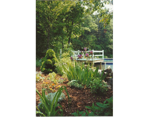 58 Greene Road Princeton, MA 01541 - Photo 14 of 17 a balcony with a tree