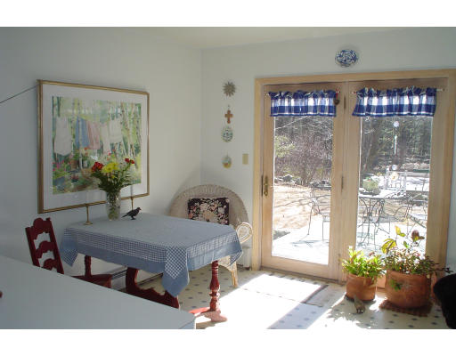 58 Greene Road Princeton, MA 01541 - Photo 3 of 17 a dining room with furniture and a floor to ceiling window