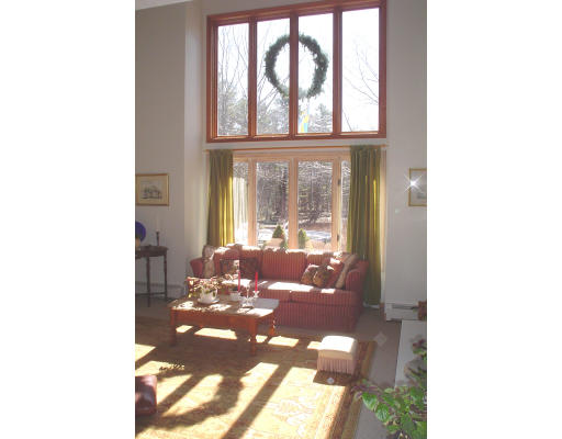 58 Greene Road Princeton, MA 01541 - Photo 5 of 17 a living room with a large window and a table