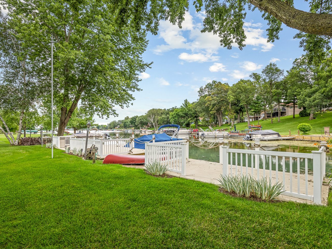 213 Lake Summerset Road Davis, IL 61019 - Photo 5 of 9 a view of a deck and a yard with green space