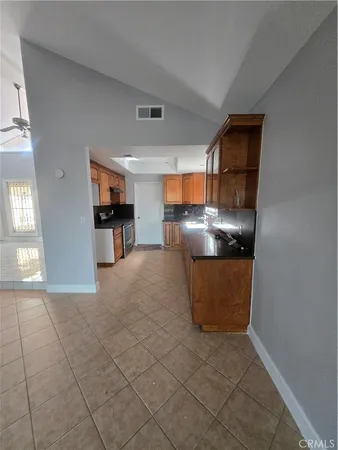 a view of a bathroom with a sink and washing machine