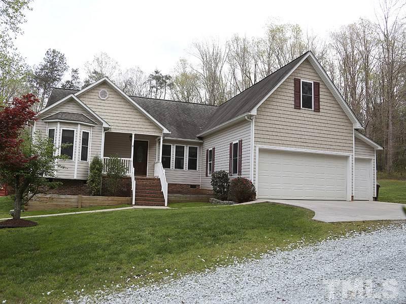 1012 Christy Ridge Court Rougemont, NC 27572 - Photo 1 of 20 a front view of house with yard and green space