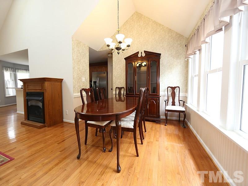 1012 Christy Ridge Court Rougemont, NC 27572 - Photo 2 of 20 a view of a dining room with furniture and wooden floor