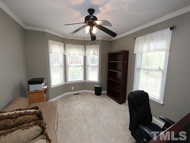 1012 Christy Ridge Court Rougemont, NC 27572 - Photo 16 of 20 a bedroom with a bed and a chair