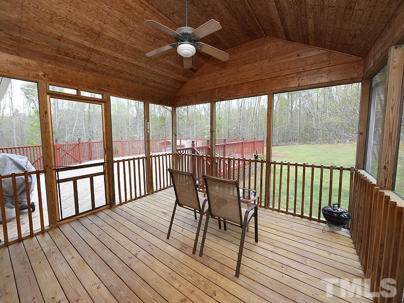 1012 Christy Ridge Court Rougemont, NC 27572 - Photo 17 of 20 a view of a roof deck with wooden floor