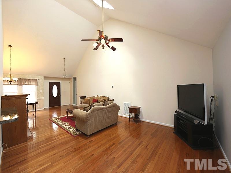 1012 Christy Ridge Court Rougemont, NC 27572 - Photo 5 of 20 a living room with furniture and a wooden floor