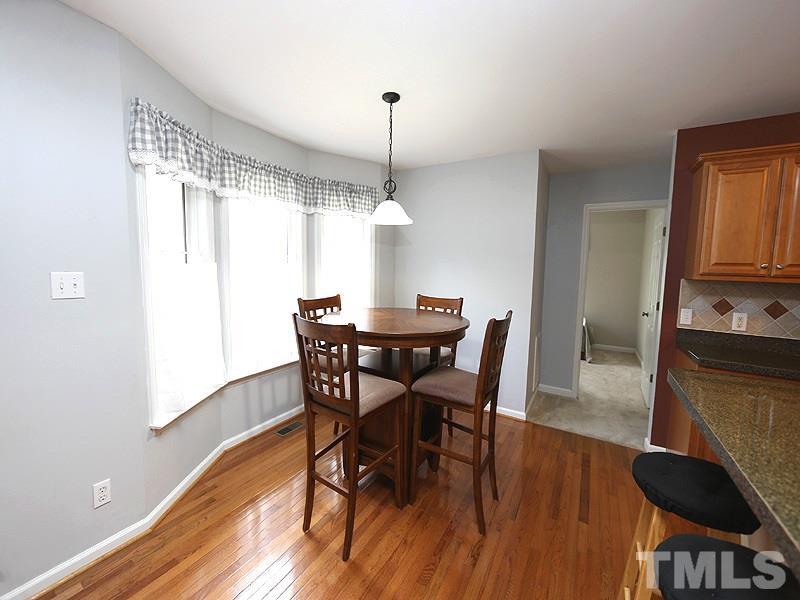 1012 Christy Ridge Court Rougemont, NC 27572 - Photo 8 of 20 a view of a dining room with furniture window and wooden floor