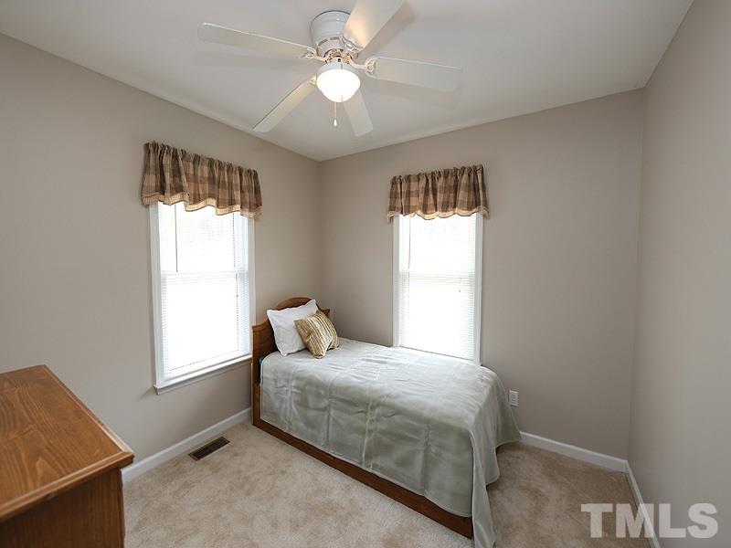 1012 Christy Ridge Court Rougemont, NC 27572 - Photo 9 of 20 a bedroom with a bed and a window