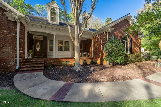 a front view of a house with entertaining space
