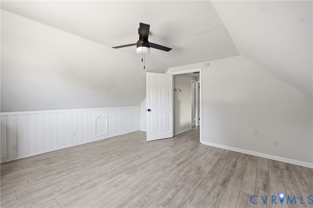 9207 Mapleway Road Richmond, VA 23229 - Photo 29 of 36 Sloped ceilings with a ceiling fan, plank-style fl