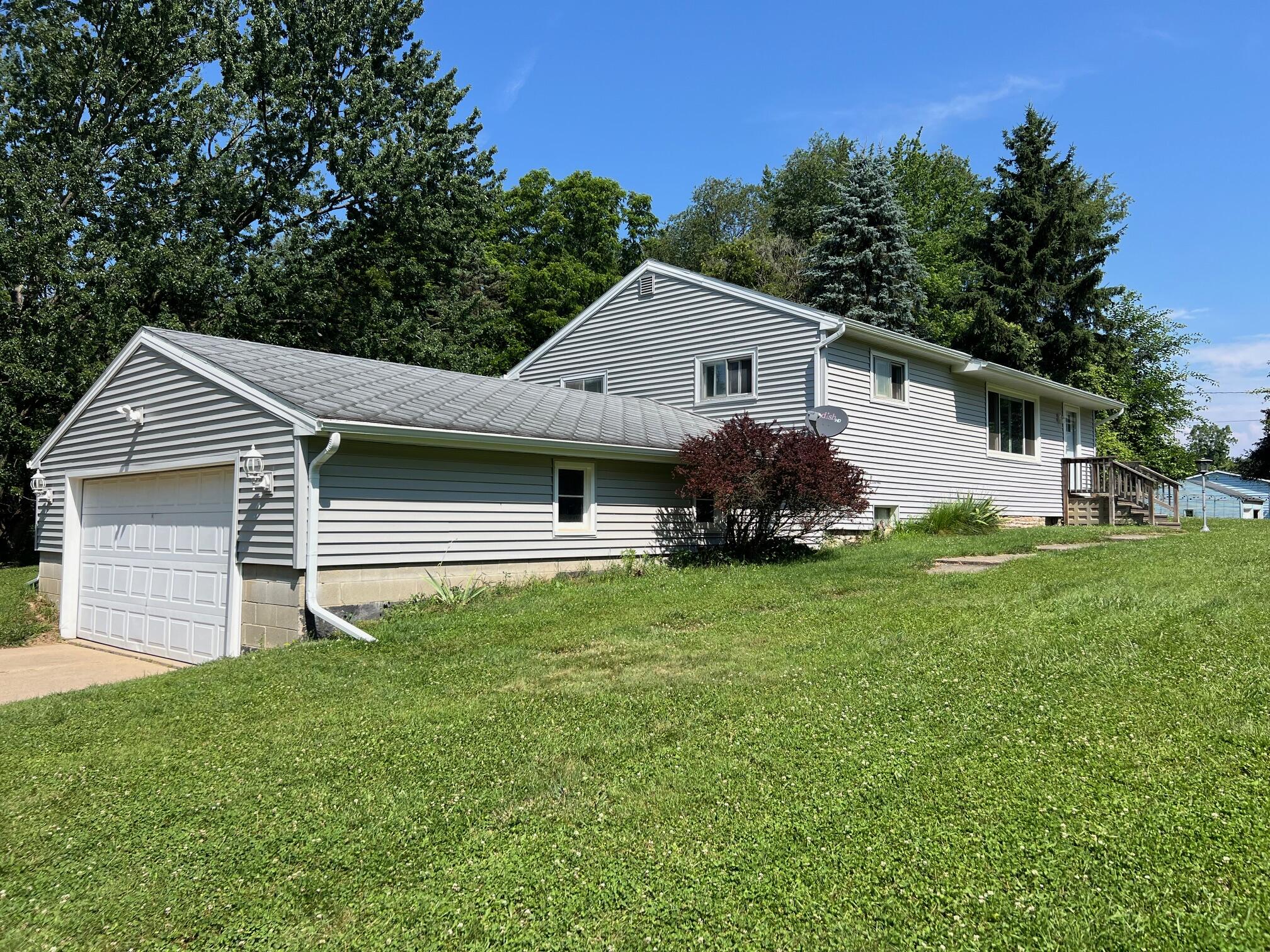 15306 Peacock Road Haslett, MI 48840 - Photo 1 of 34 Front