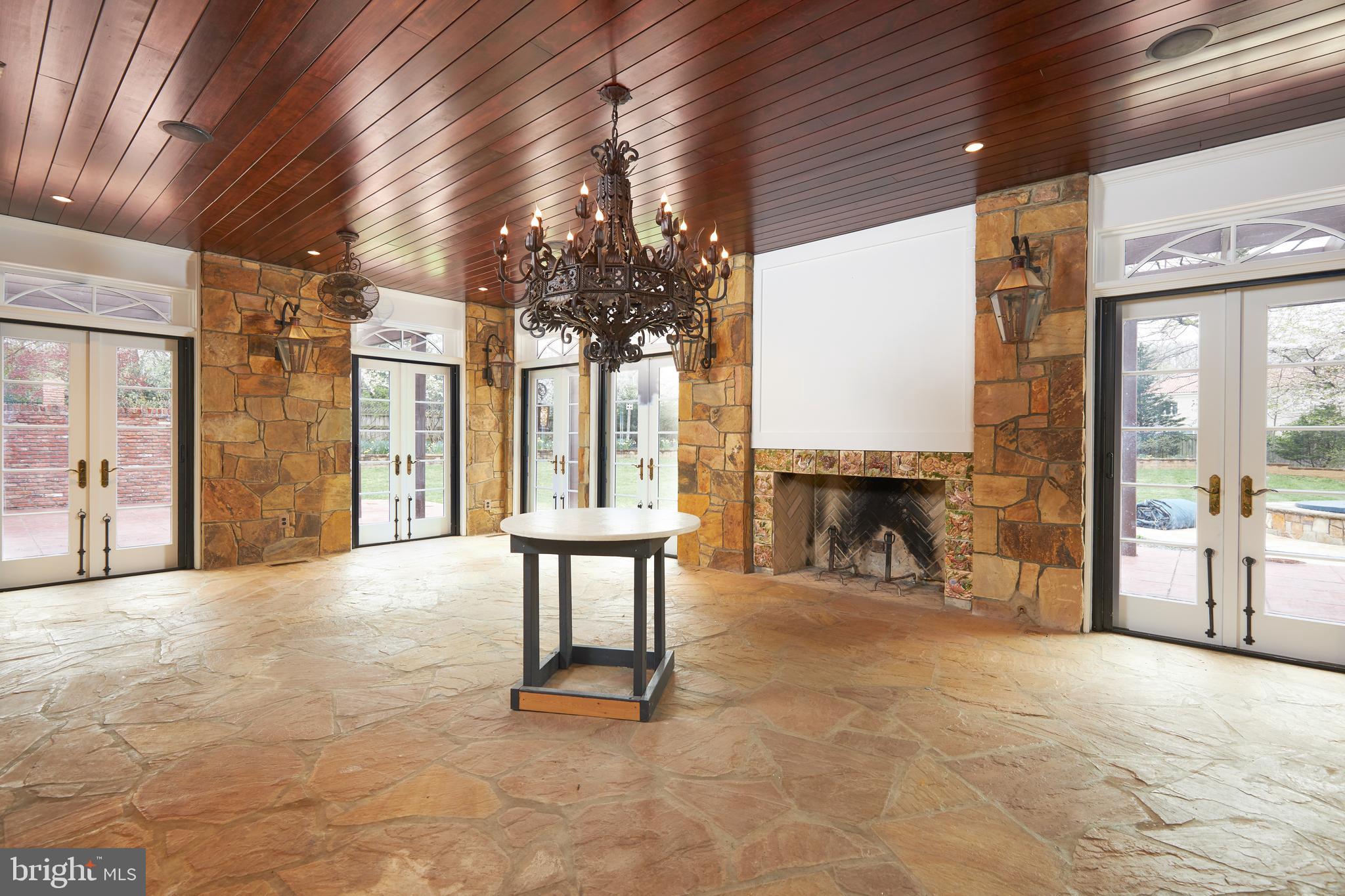10304 Iron Gate Road Potomac, MD 20854 - Photo 21 of 39 Stone (heated floor) "Retreat" with sliding/screen