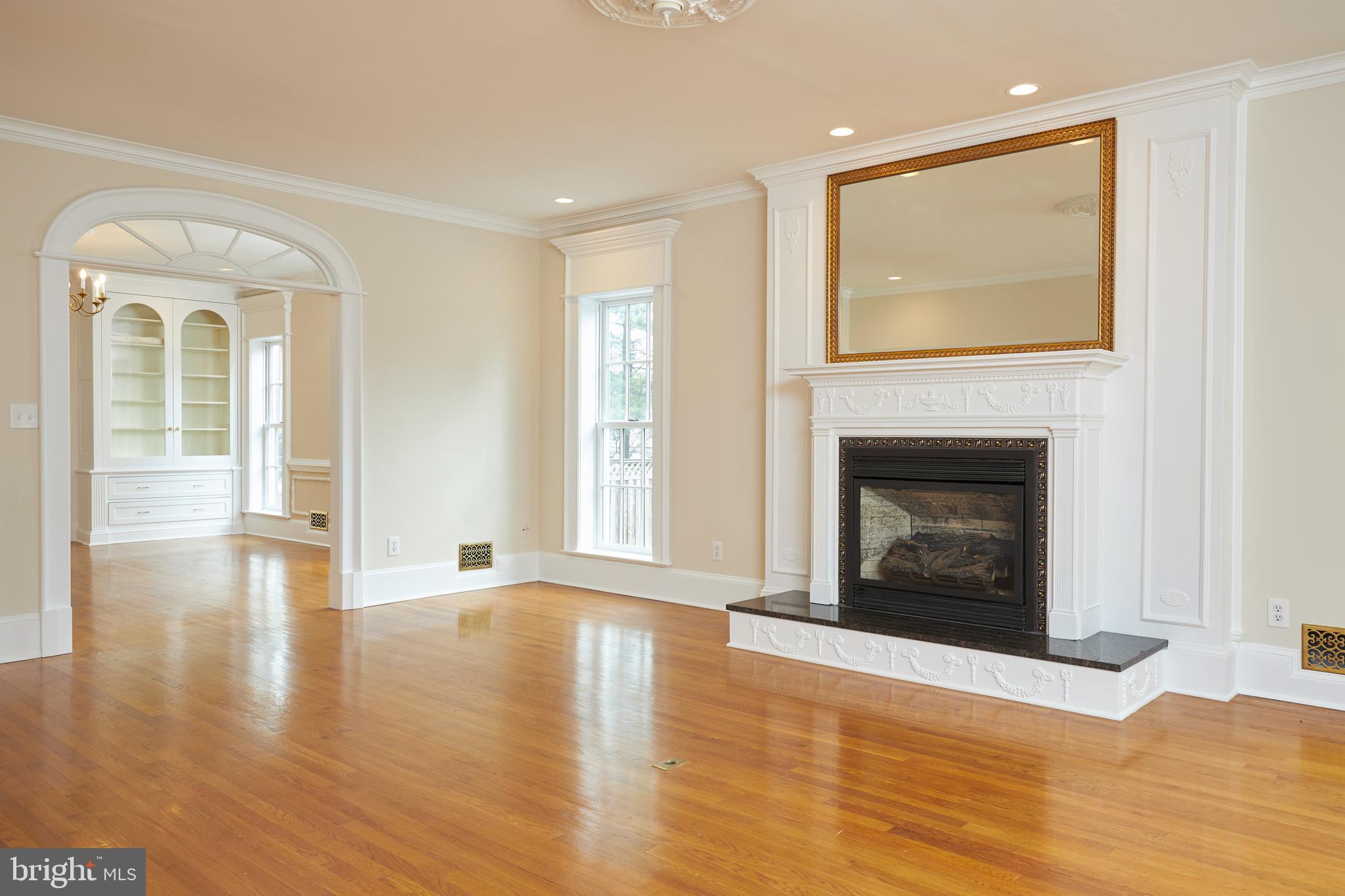 10304 Iron Gate Road Potomac, MD 20854 - Photo 9 of 39 Formal Living Room with Gas or Wood Burning FP