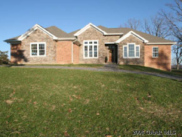 1161 Fadley Road Weyers Cave, VA 24486 - Photo 1 of 1 a front view of a house with a garden