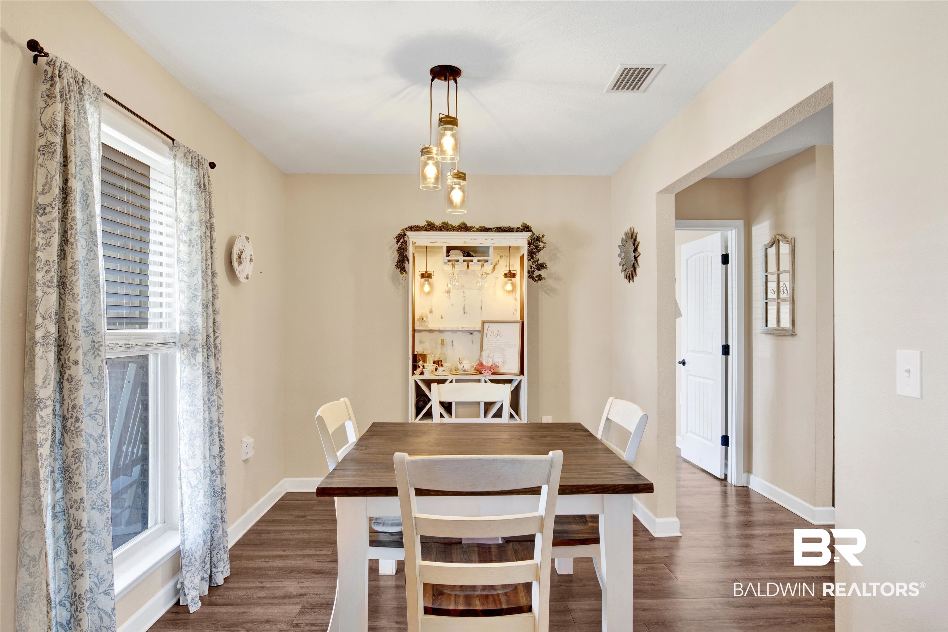 13676 Styx River Road Stapleton, AL 36578 - Photo 12 of 30 Dining space with dark wood-type flooring