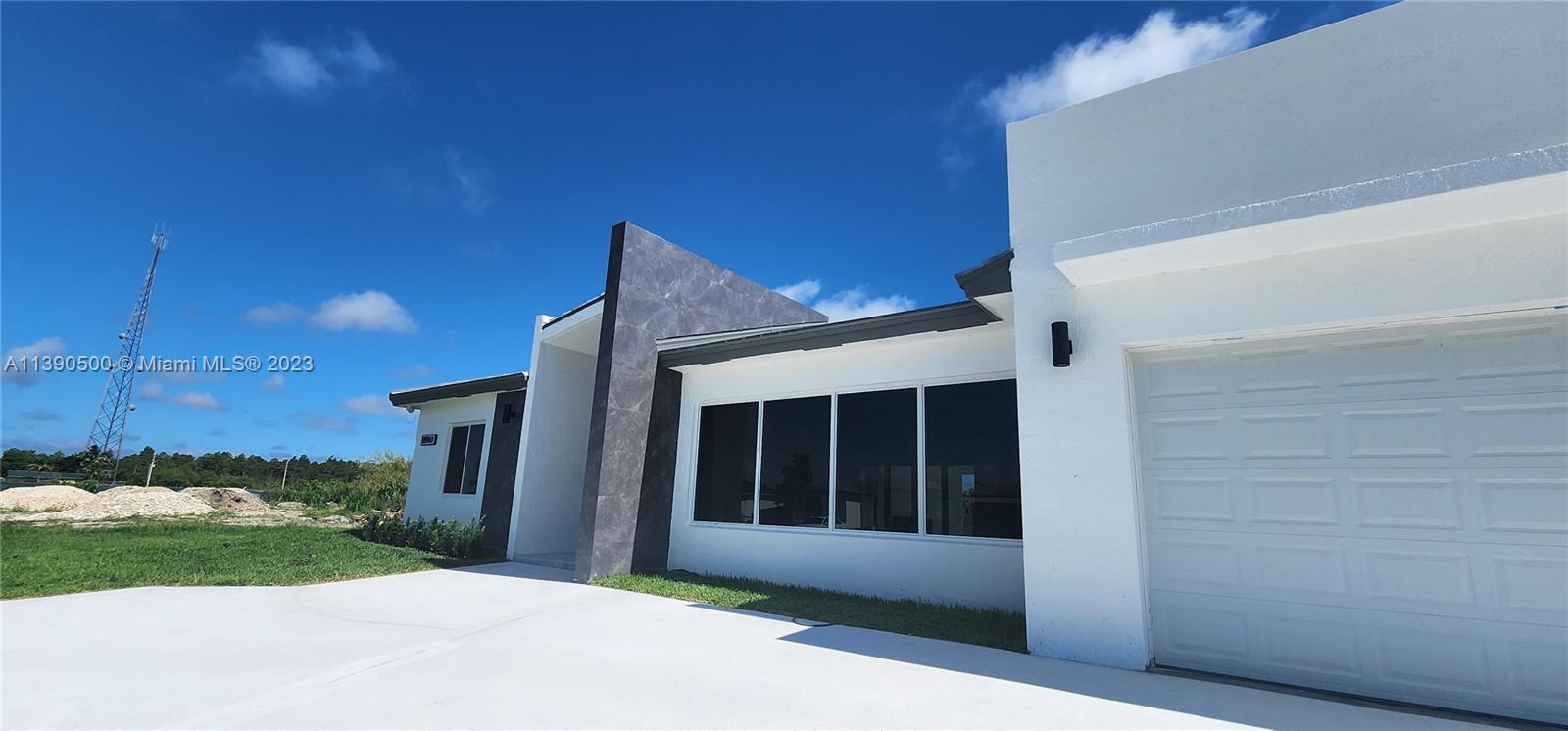 18961 Southwest 359th Street Homestead, FL 33034 - Photo 23 of 54 a view of a house with a yard