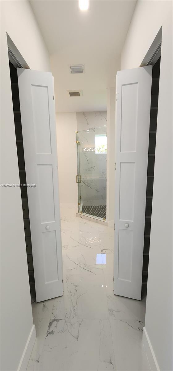 18961 Southwest 359th Street Homestead, FL 33034 - Photo 40 of 54 wooden floor in an empty room
