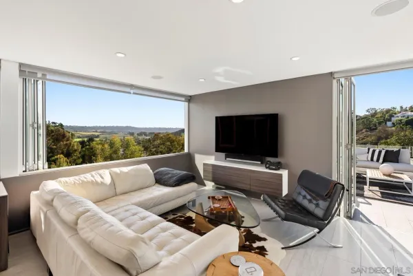a view of a terrace with furniture and outdoor space