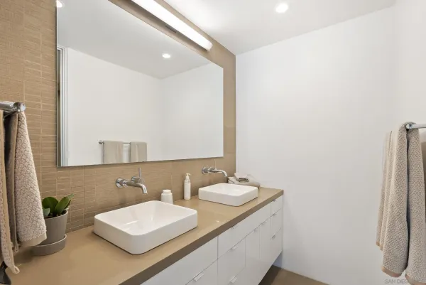 a bathroom with a shower and a toilet