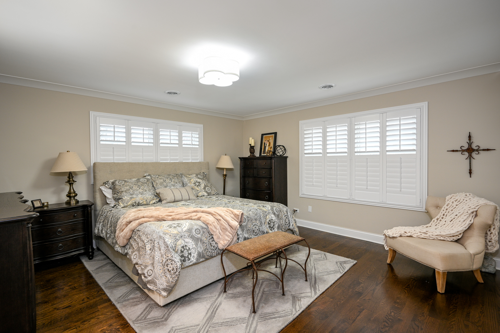 530 Anthony Street, Unit 530 Glen Ellyn, IL 60137 - Photo 12 of 25 a bedroom with a bed and wooden floor