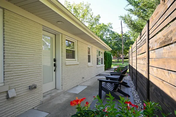 a backyard of a house with seating space