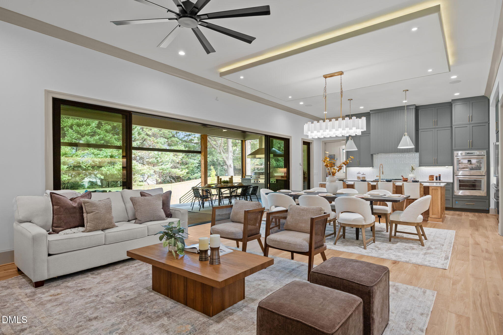 1116 Kimberly Drive Raleigh, NC 27609 - Photo 8 of 71 a living room with furniture ceiling fan and a large window
