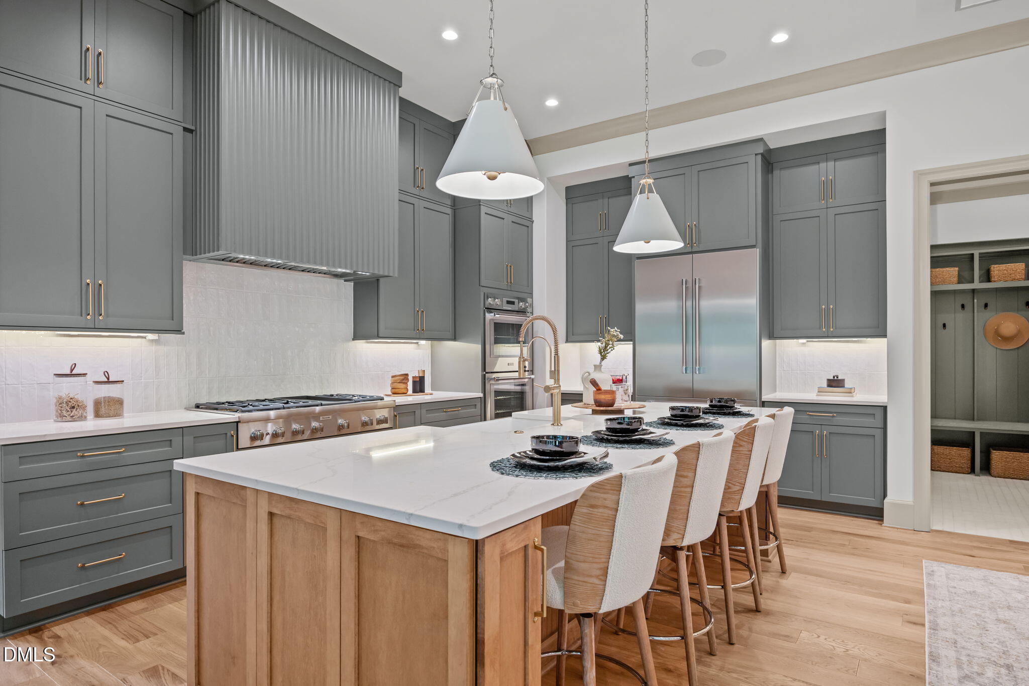 1116 Kimberly Drive Raleigh, NC 27609 - Photo 11 of 71 a kitchen with a table chairs stove and cabinets