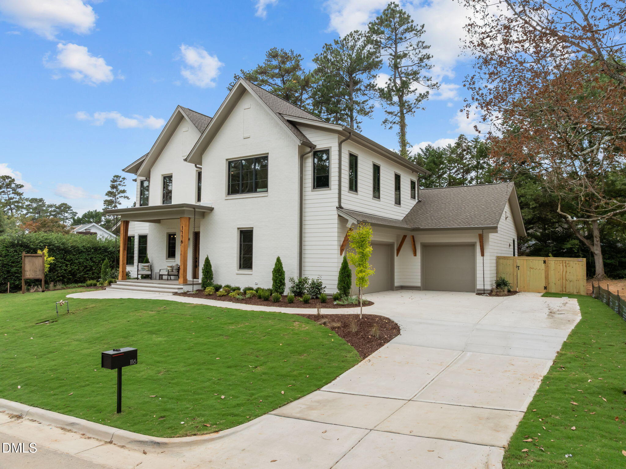 1116 Kimberly Drive Raleigh, NC 27609 - Photo 2 of 71 a front view of a house with garden