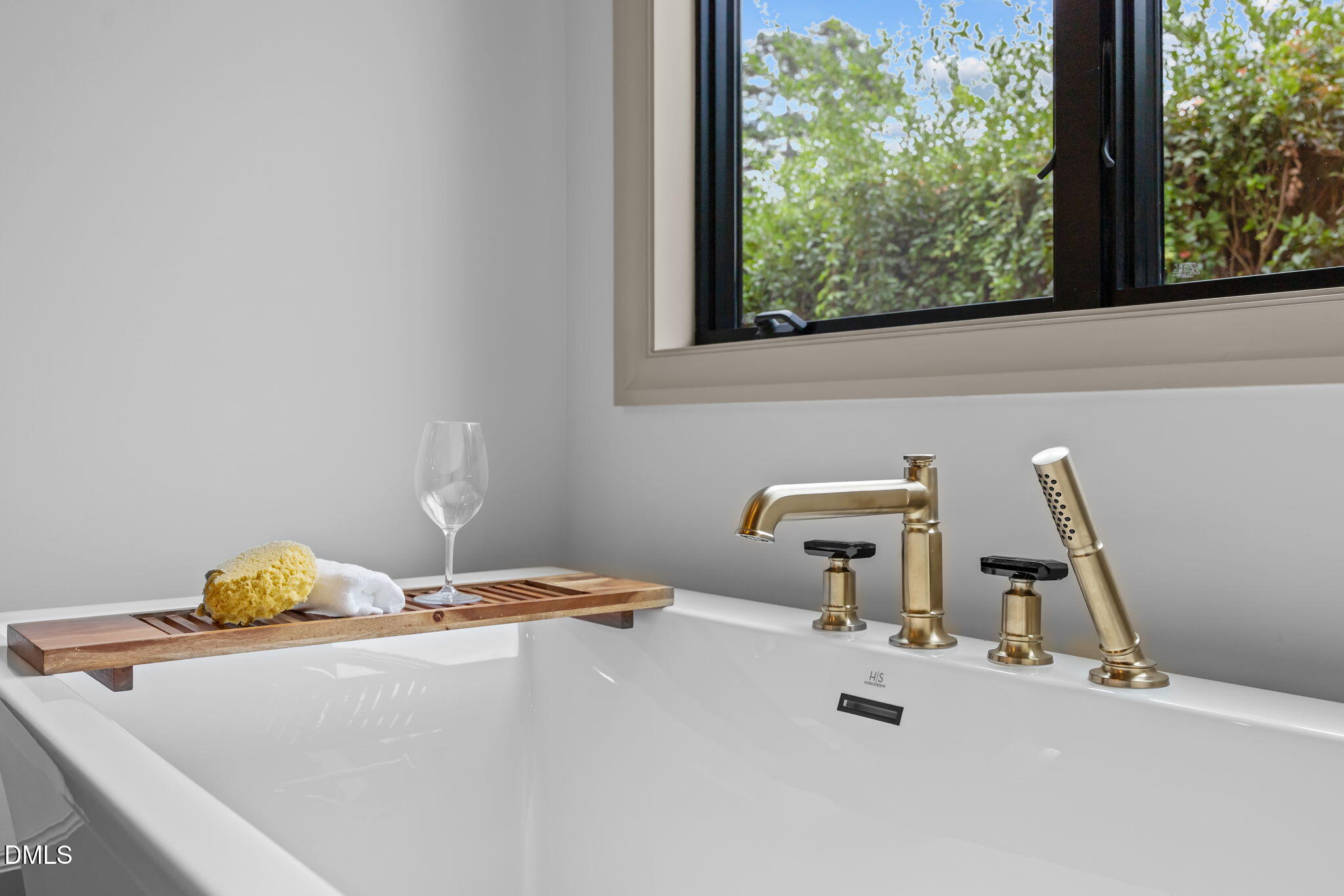 1116 Kimberly Drive Raleigh, NC 27609 - Photo 38 of 71 a bathroom with a sink and a window