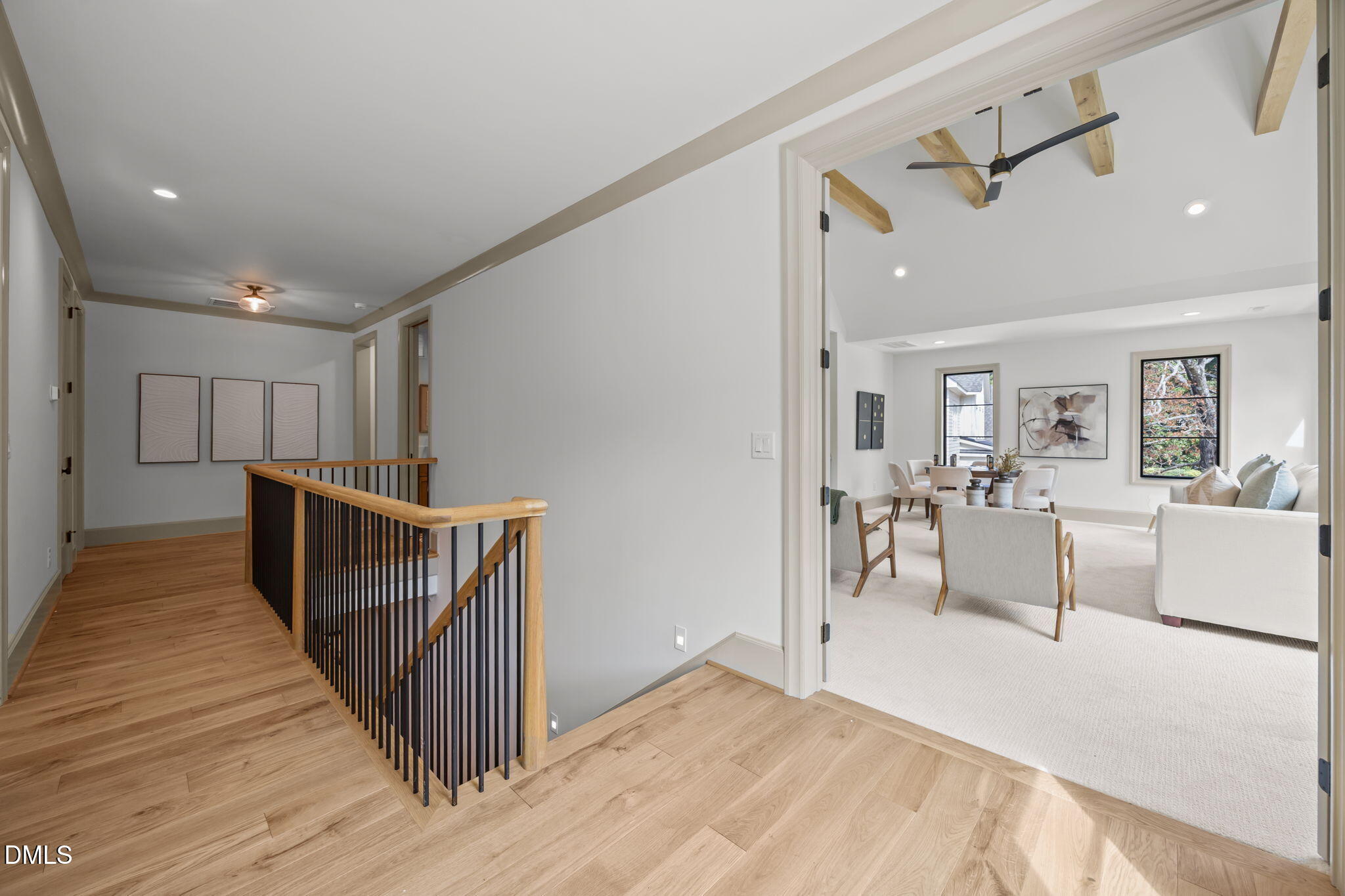 1116 Kimberly Drive Raleigh, NC 27609 - Photo 41 of 71 a view of a hallway with furniture and wooden floor
