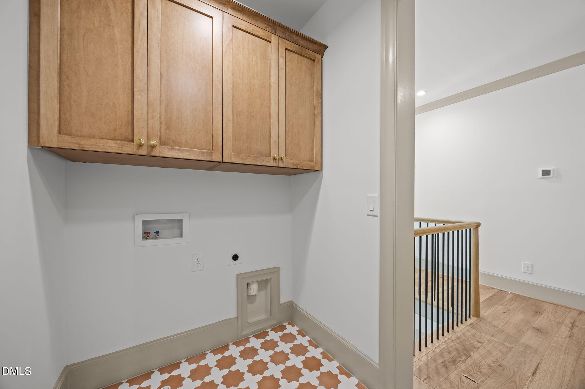 1116 Kimberly Drive Raleigh, NC 27609 - Photo 51 of 71 a view of a hallway with closet and wooden floor