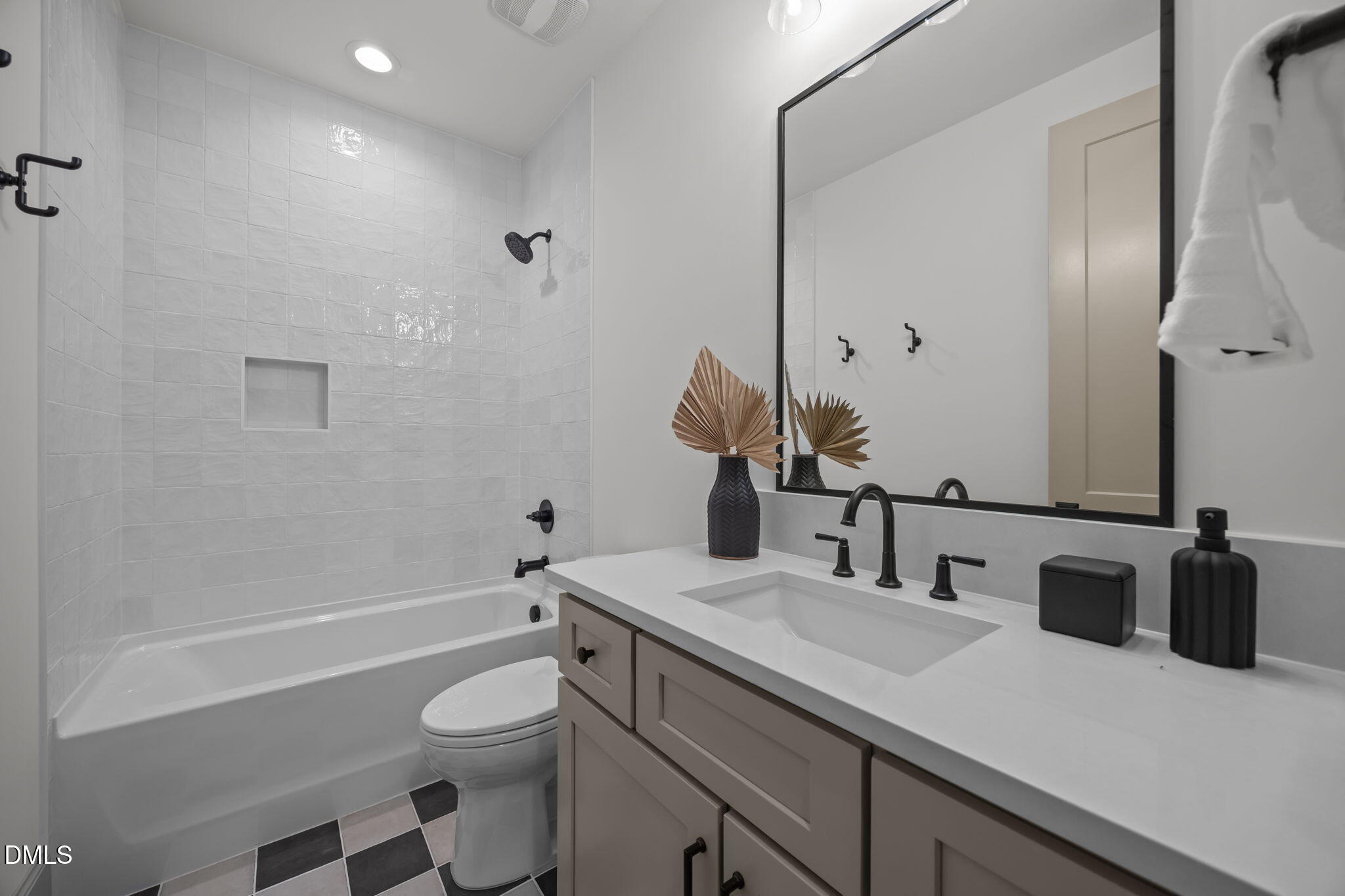 1116 Kimberly Drive Raleigh, NC 27609 - Photo 60 of 71 a bathroom with a granite countertop sink a toilet and shower