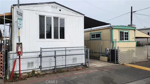 a front view of a house with a garage