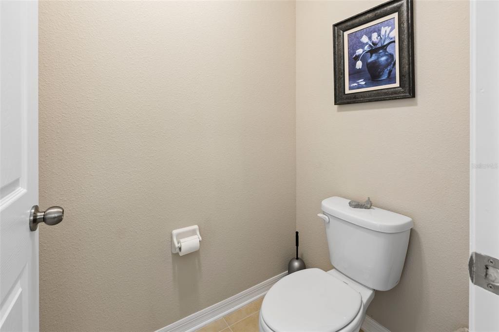 31046 Parrot Reef Court Wesley Chapel, FL 33545 - Photo 40 of 99 a white toilet sitting next to a white walls