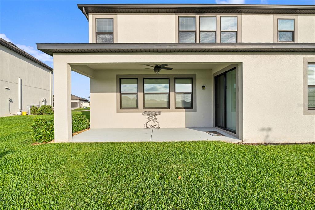 31046 Parrot Reef Court Wesley Chapel, FL 33545 - Photo 55 of 99 a house view with a outdoor space