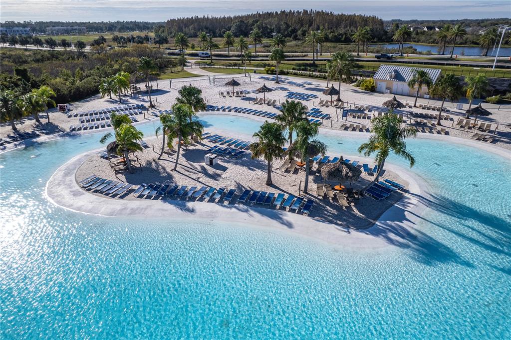 31046 Parrot Reef Court Wesley Chapel, FL 33545 - Photo 77 of 99 an aerial view of a house with a lake view