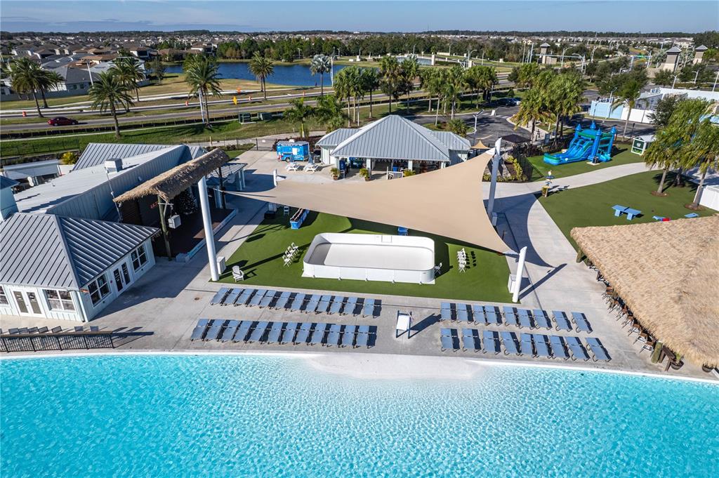 31046 Parrot Reef Court Wesley Chapel, FL 33545 - Photo 79 of 99 swimming pool view with a seating space