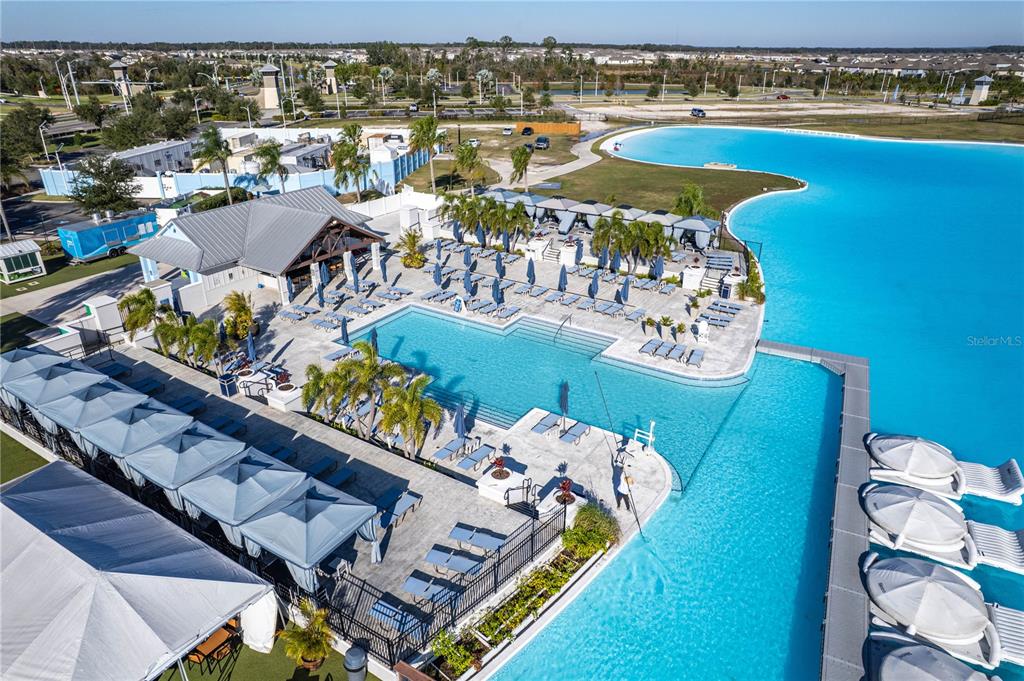31046 Parrot Reef Court Wesley Chapel, FL 33545 - Photo 80 of 99 a view of swimming pool with outdoor seating