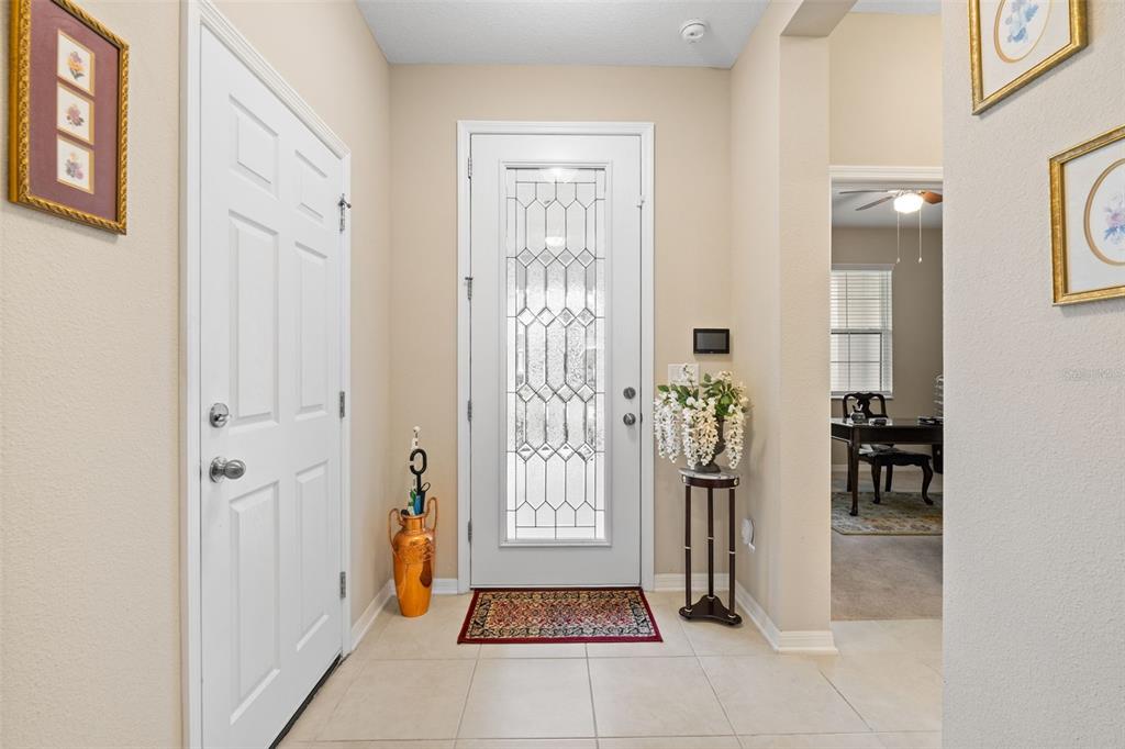 31046 Parrot Reef Court Wesley Chapel, FL 33545 - Photo 8 of 99 a view of entryway with livingroom and furniture