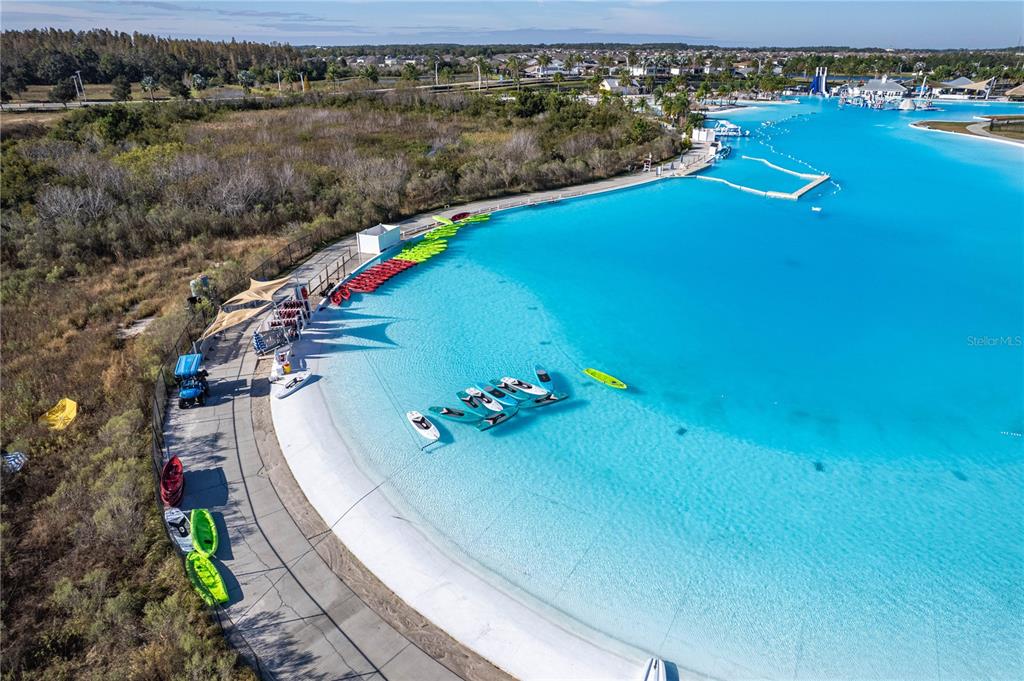 31046 Parrot Reef Court Wesley Chapel, FL 33545 - Photo 92 of 99 a view of a lake with a mountain
