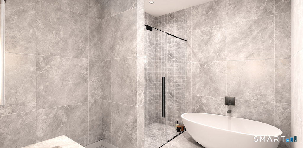 2 Arapahoe Road, Unit 410 West Hartford, CT 06107 - Photo 22 of 29 a bathroom with a sink and shower
